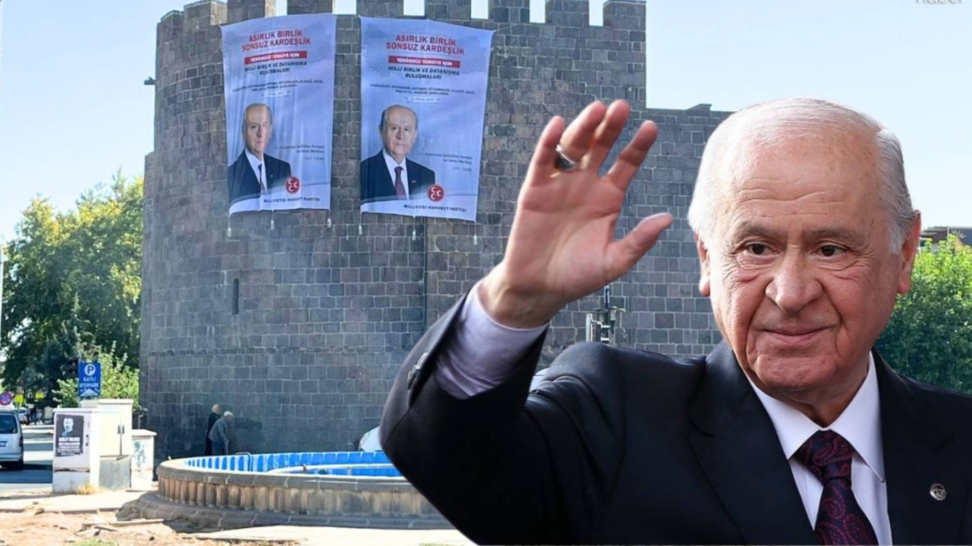 diyarbakir surlarina devlet bahceli posterleri asildi wGUjs6Wa